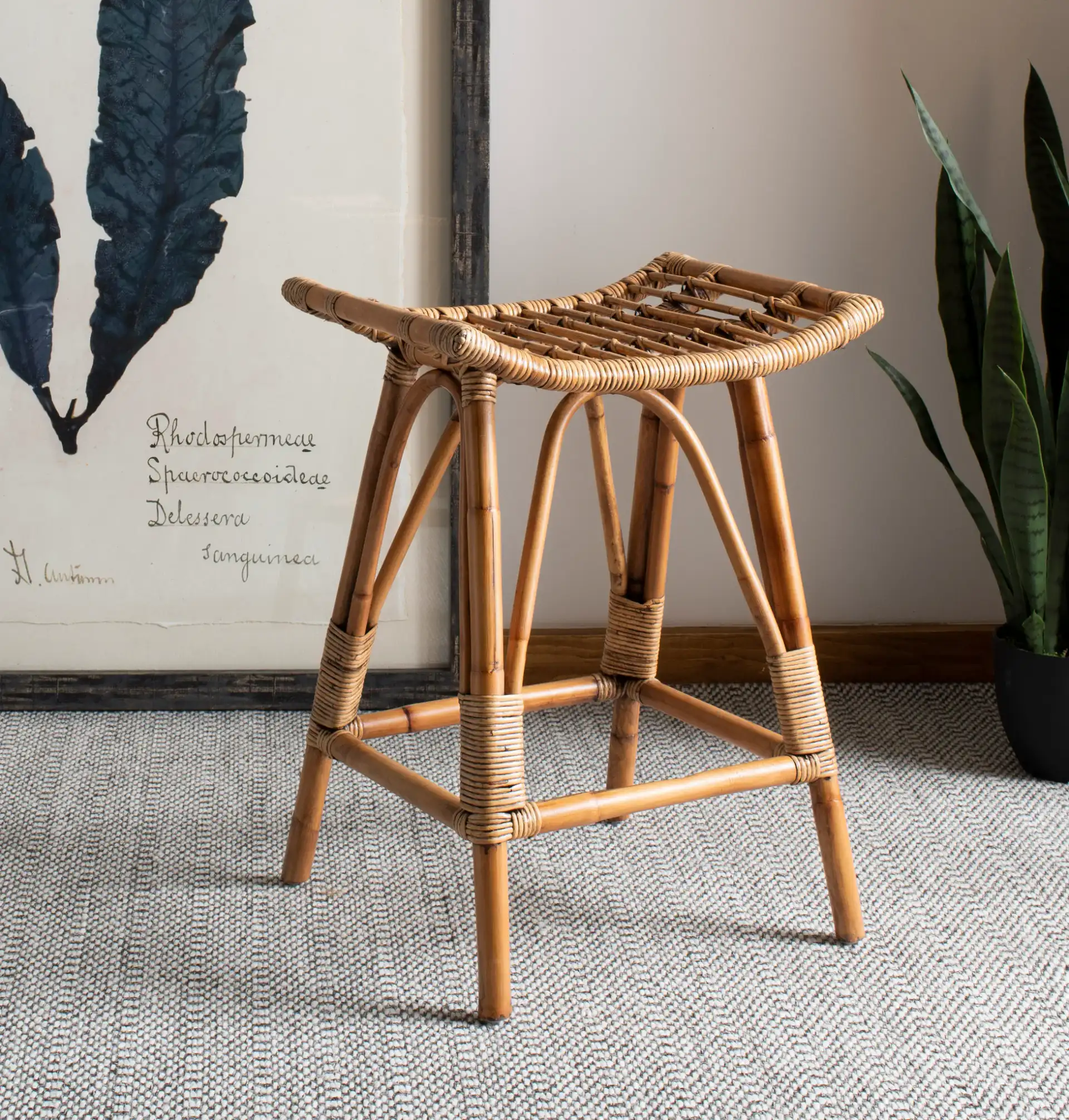 Leda Rattan Counter Stool in Brown in a styled room