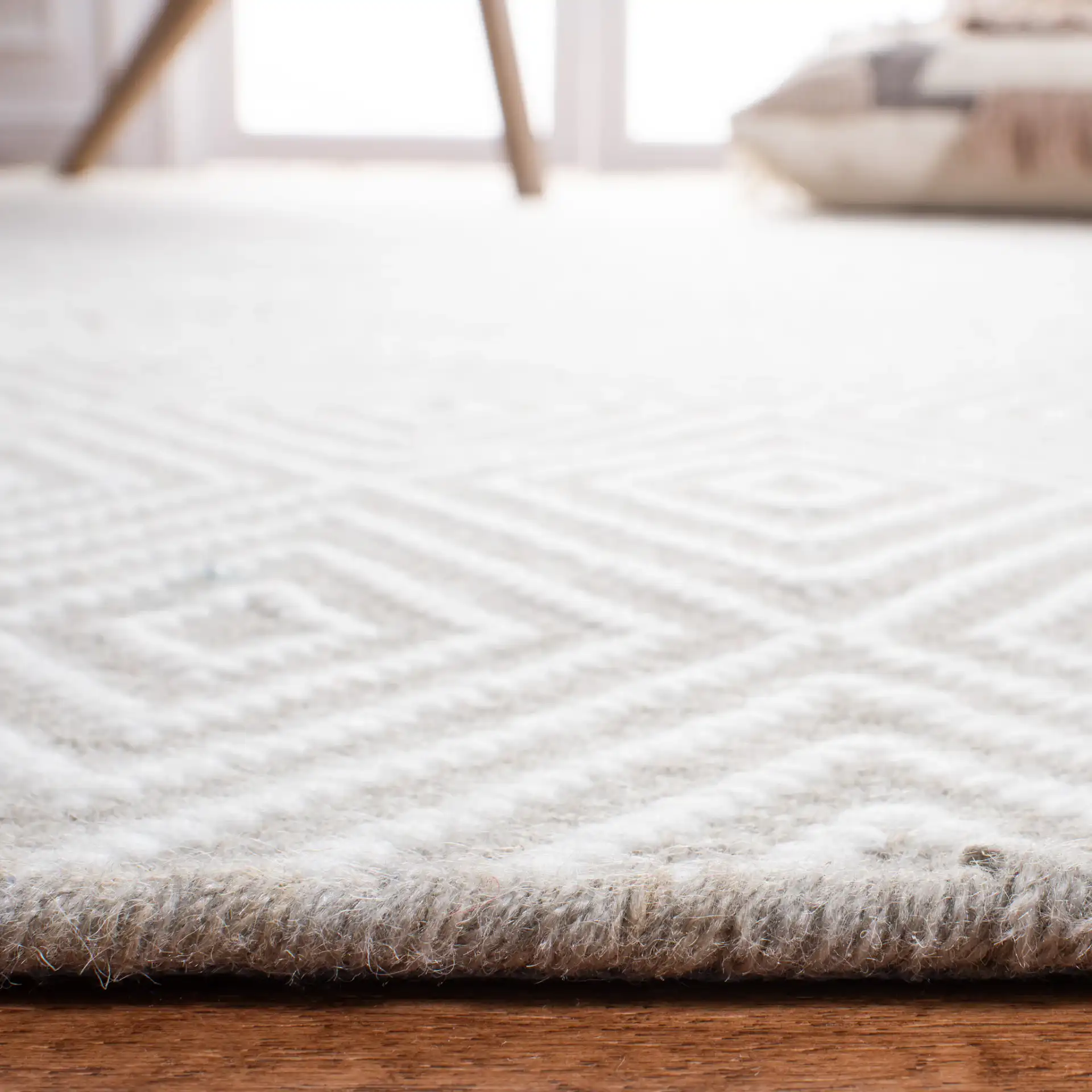 Wilton Nested Diamond Hand-Hooked Wool Rug in Light Gray / Ivory in a styled room