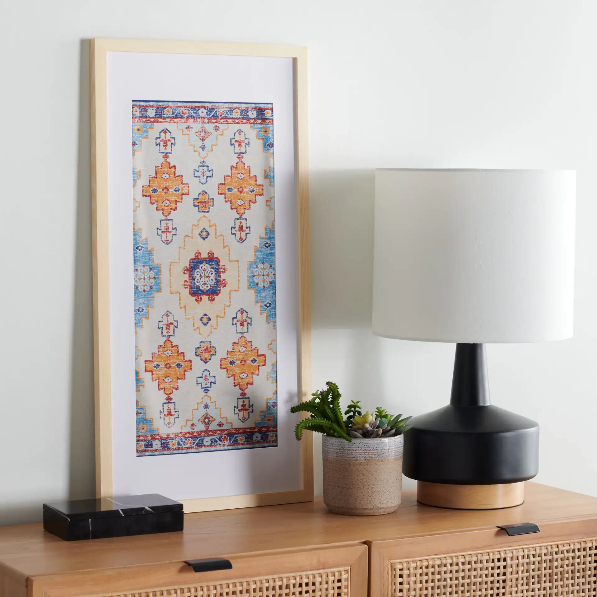 Sumia 29X14 Framed Textile Art in Blue / Orange in a styled room