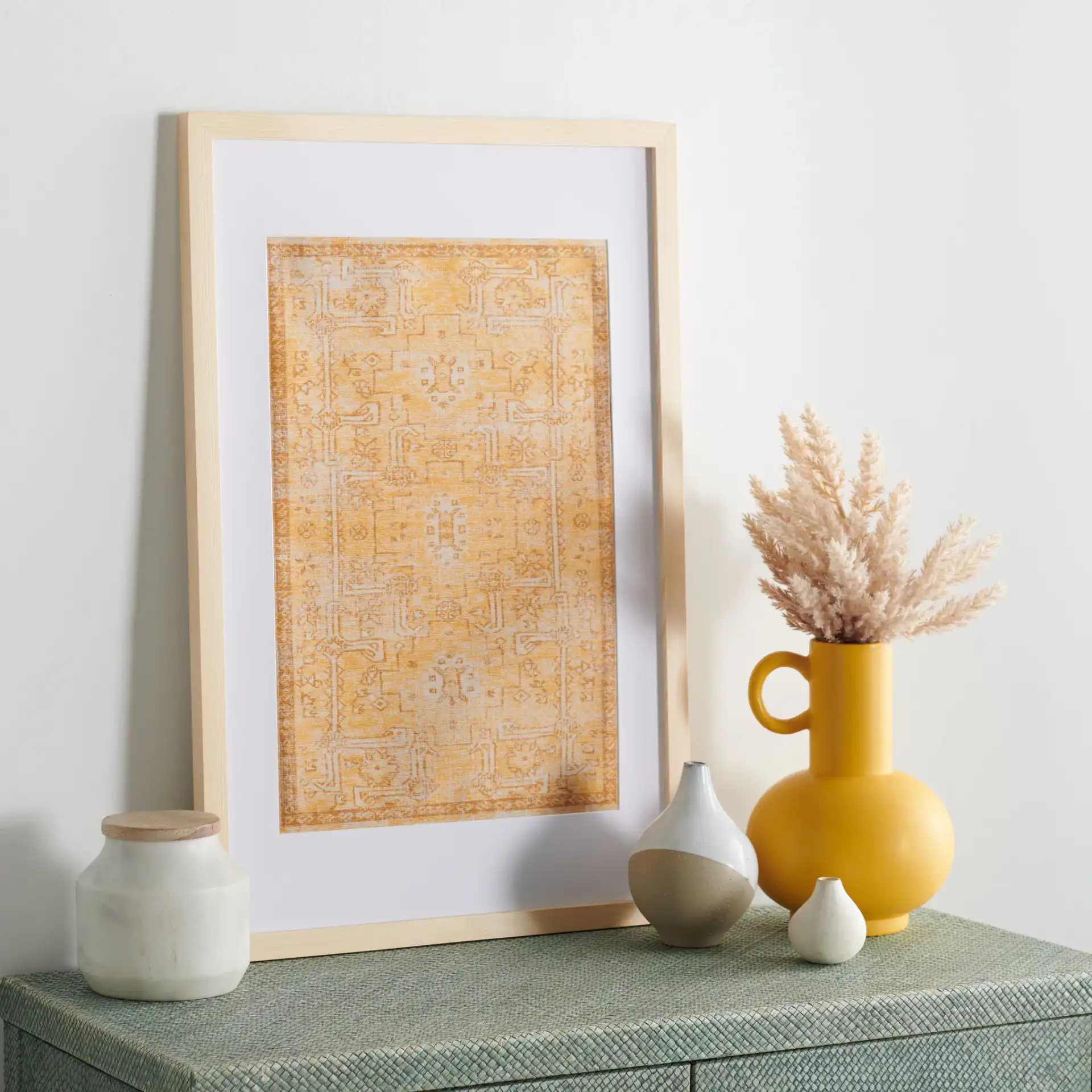 Renaldi Framed Textile Art in Gold in a styled room