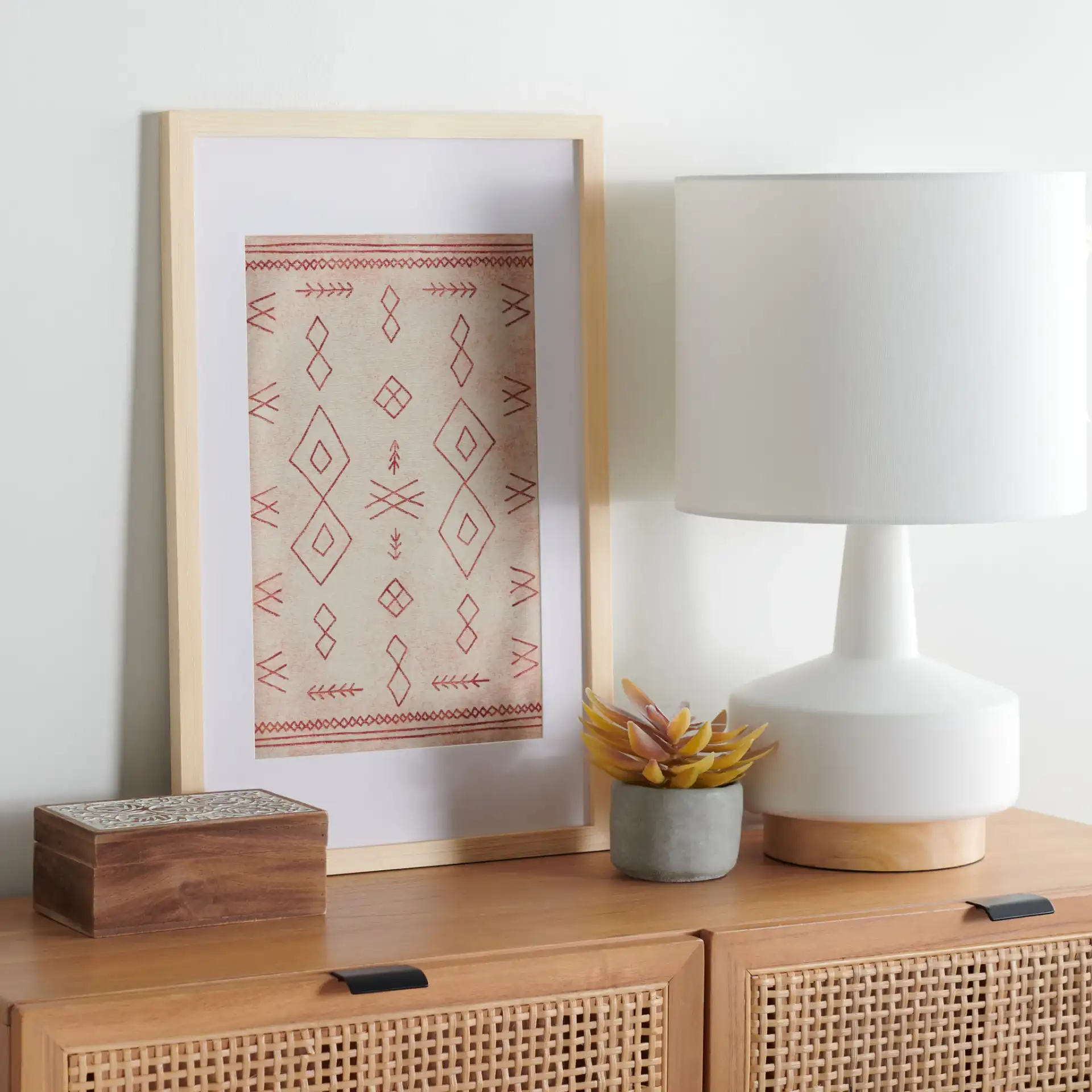 Rika Framed Textile Art in Rust / Beige in a styled room