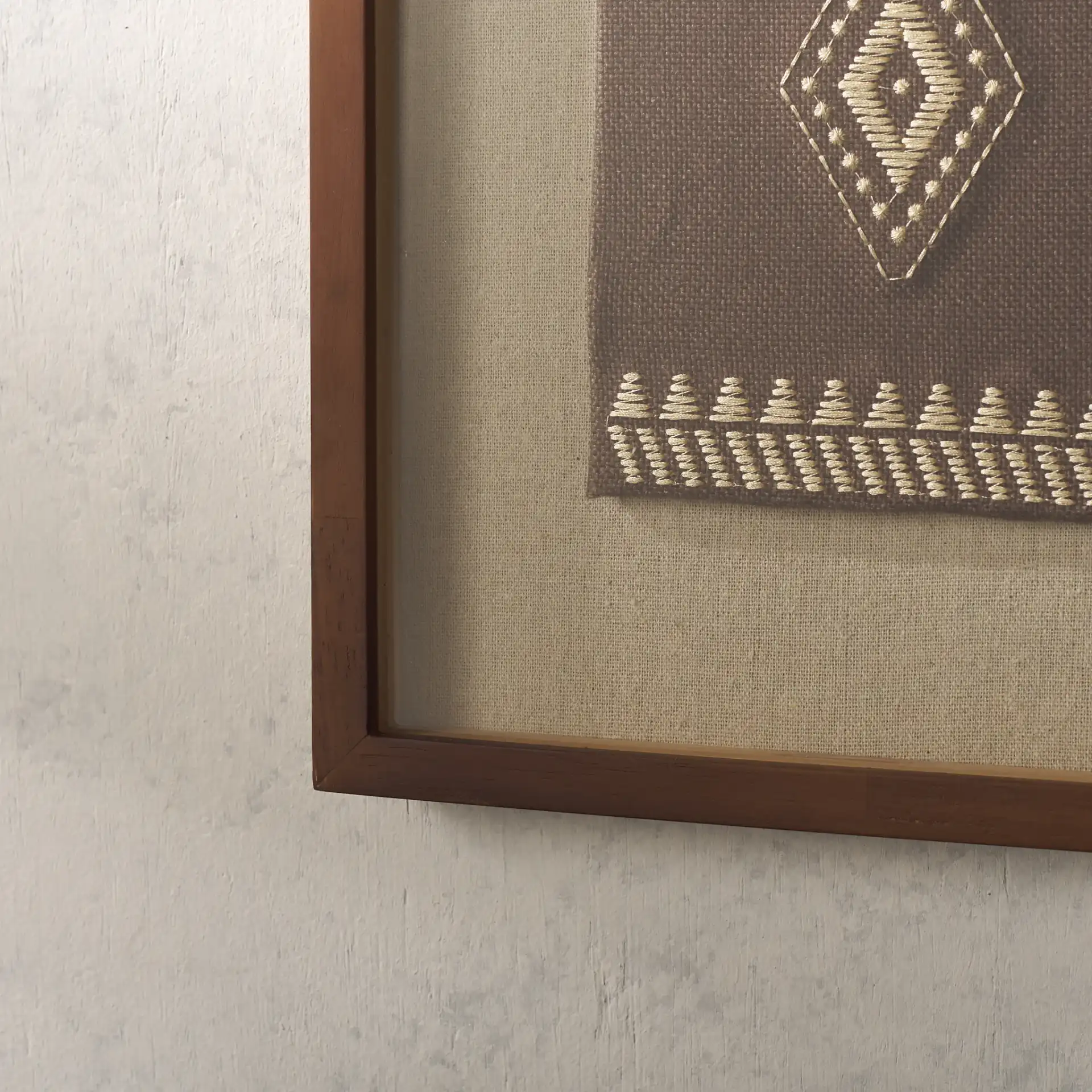Zarra Textile Art in Brown in a styled room