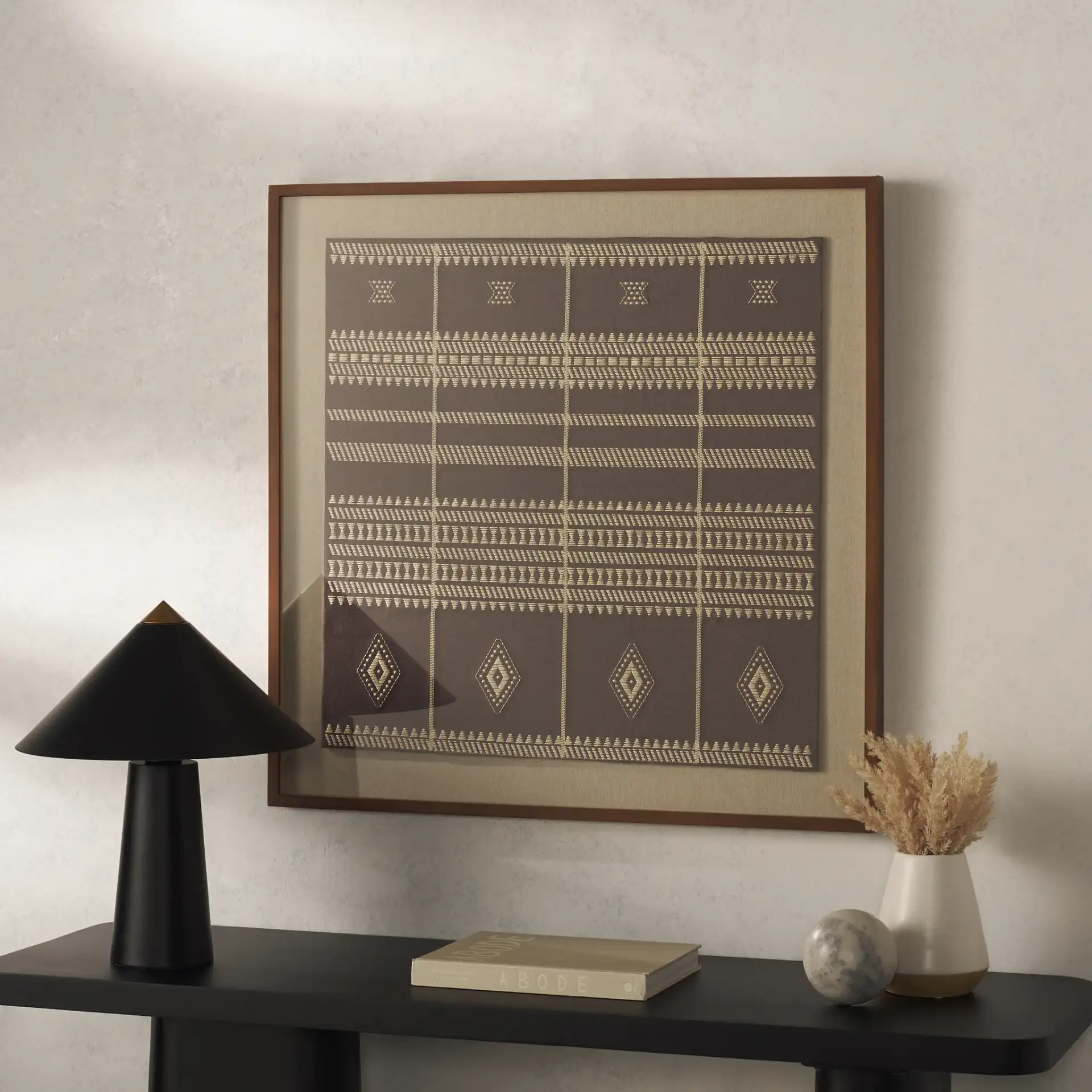 Zarra Textile Art in Brown in a styled room