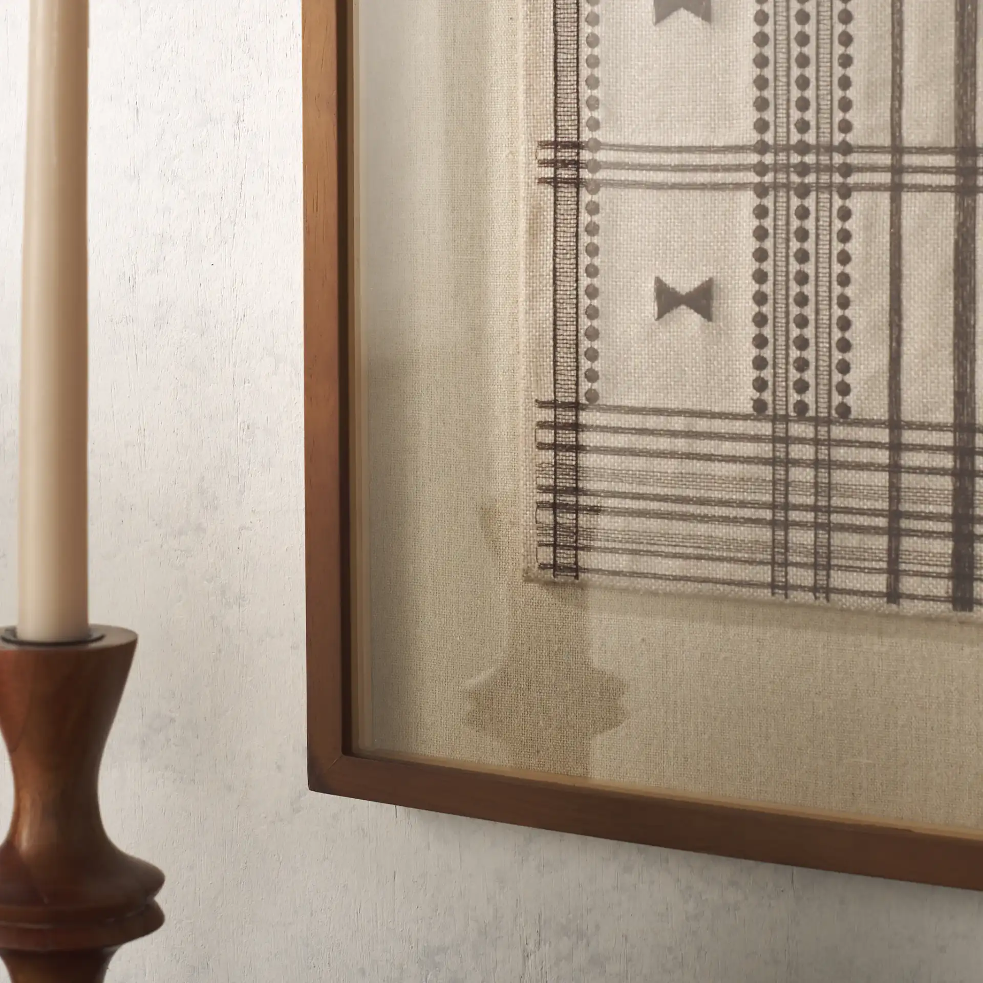 Tarra Textile Art in Brown in a styled room
