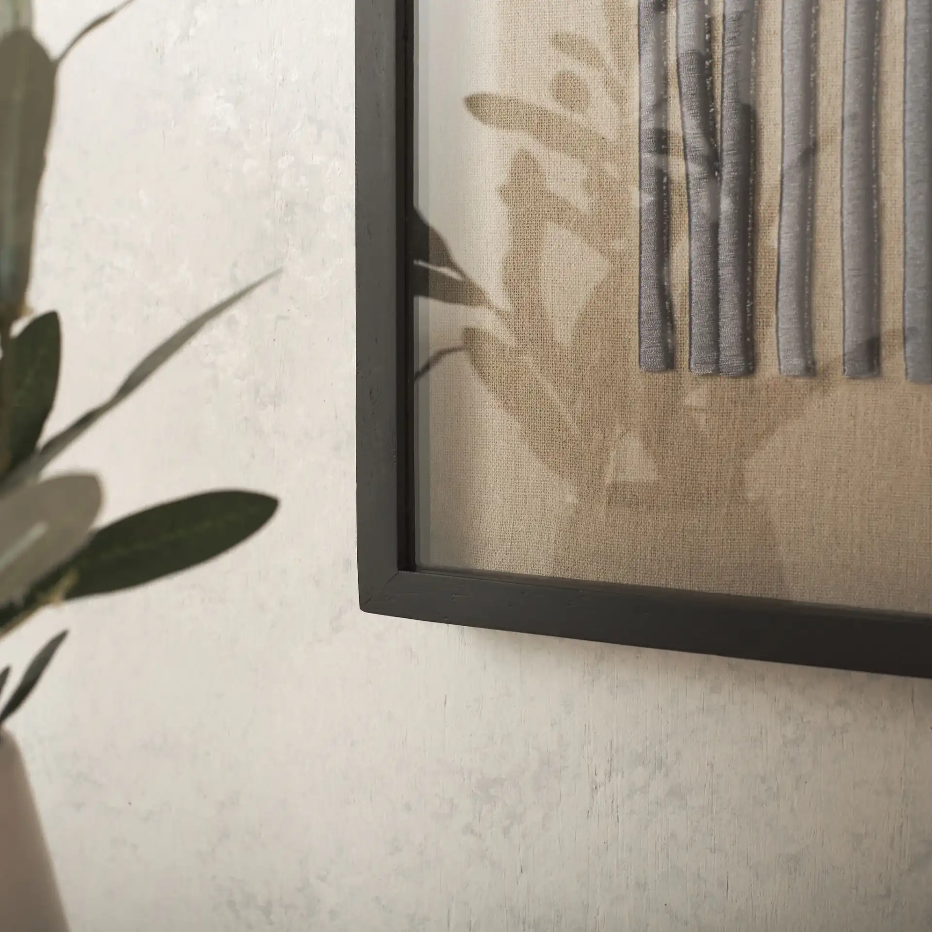Kio Embroidery Art in Black in a styled room