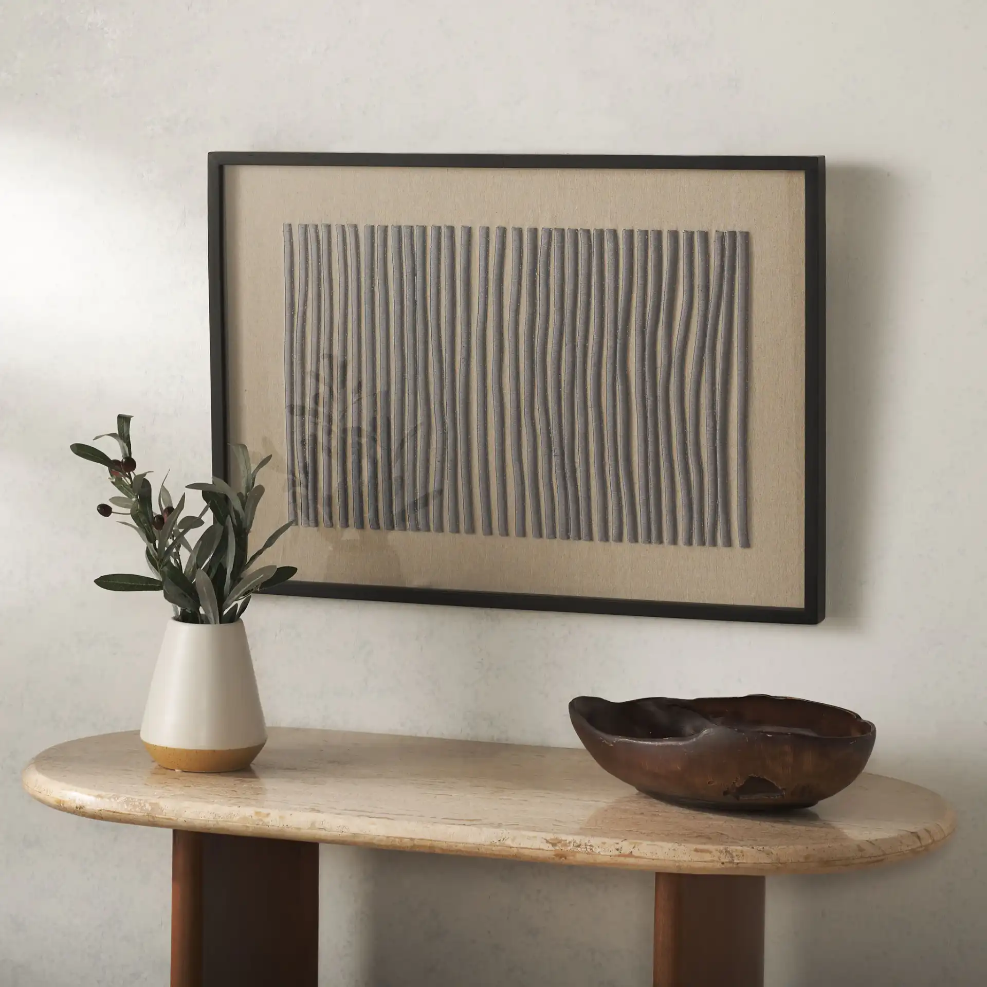 Kio Embroidery Art in Black in a styled room