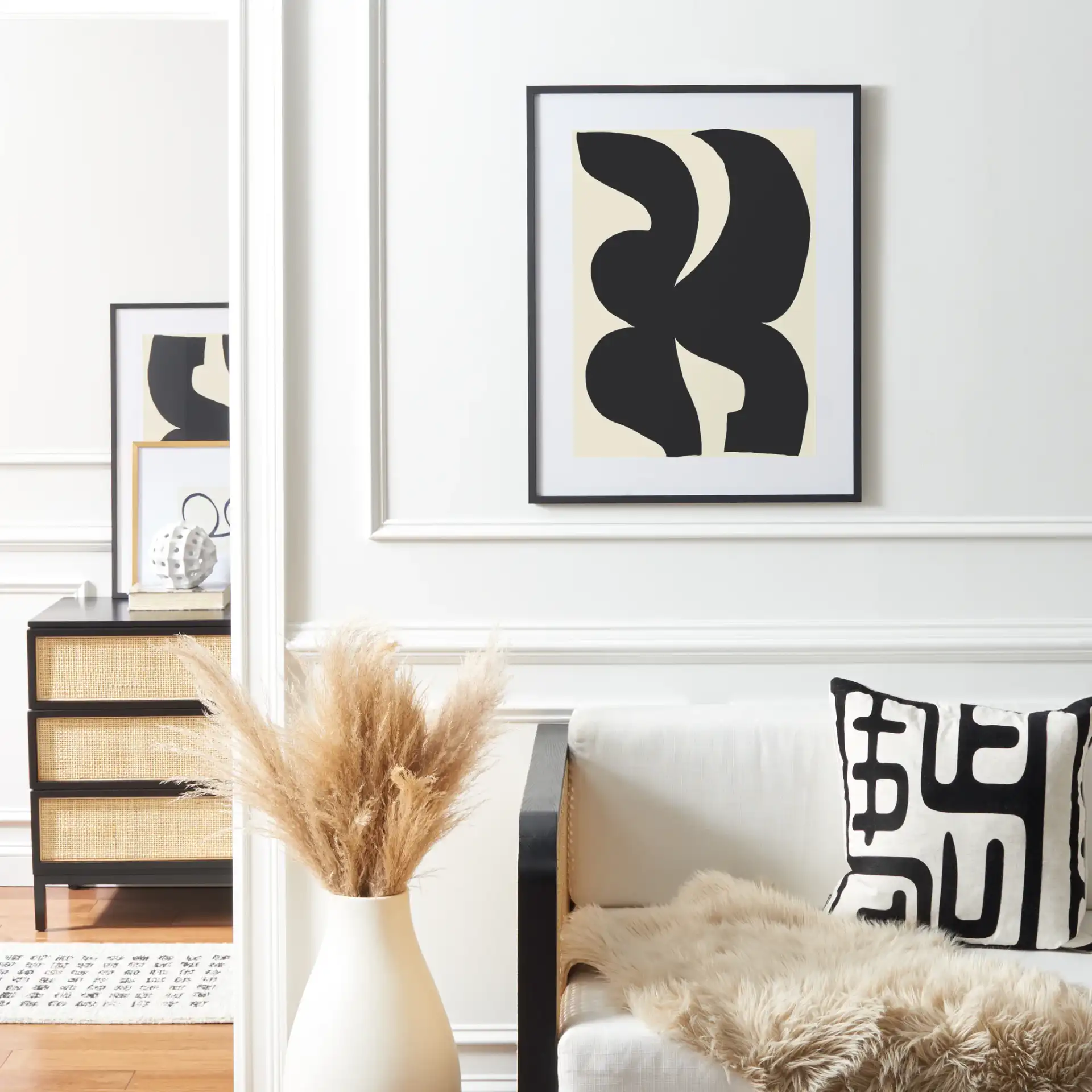 Poet'S Pen Wall Art in Antique Ivory / Black in a styled room