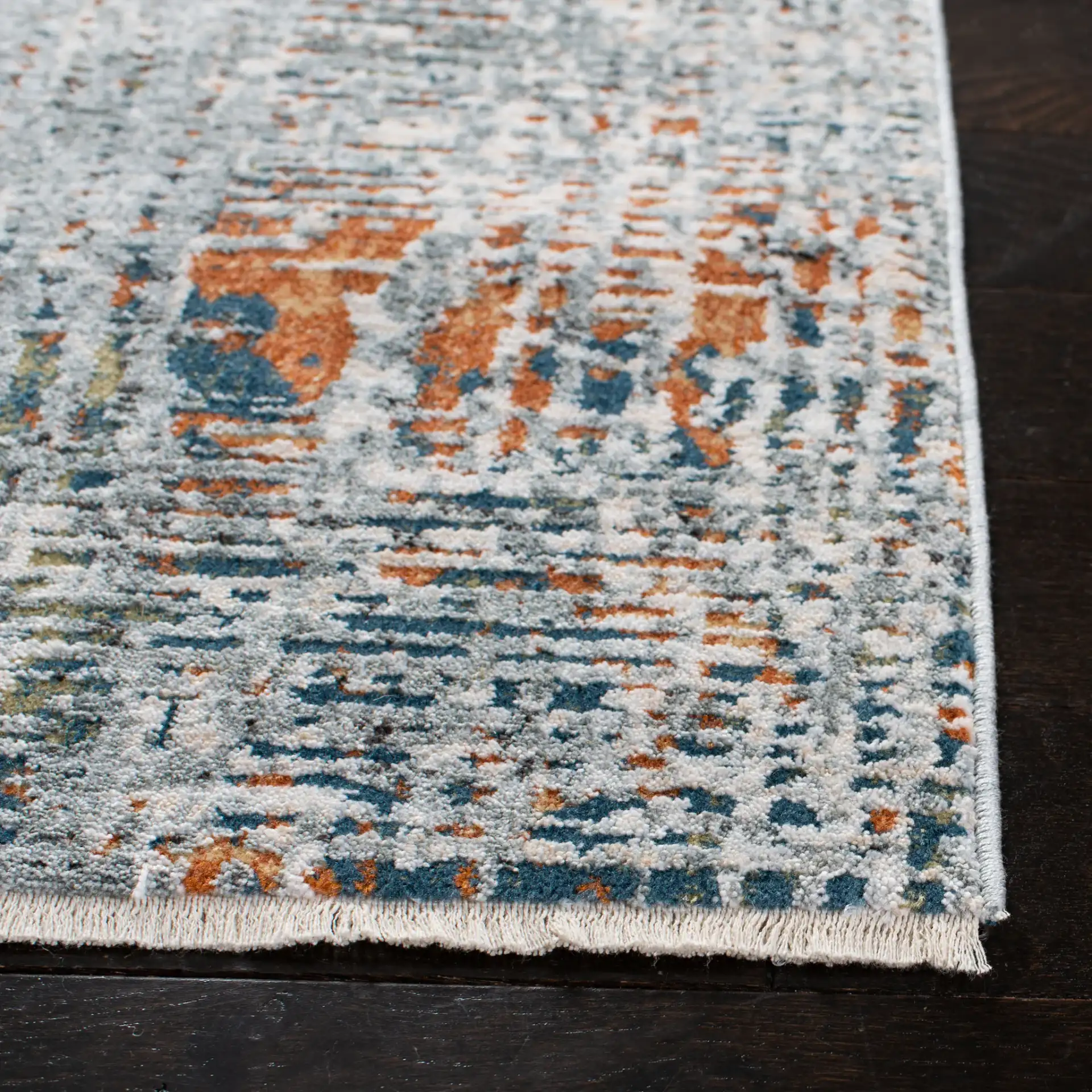 Winston Abstract Grid Rug in Gray / Beige in a styled room