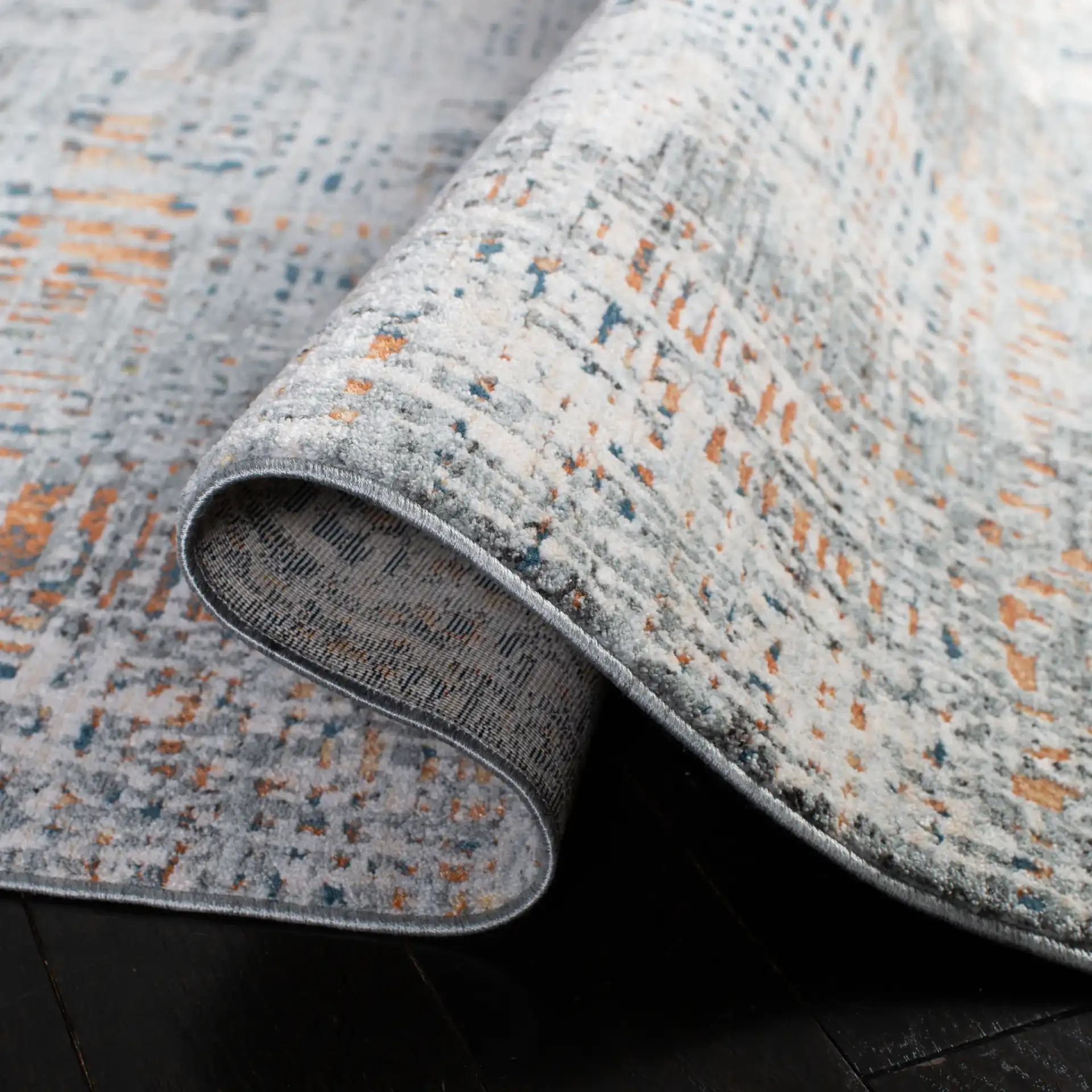 Winston Abstract Grid Rug in Gray / Beige in a styled room