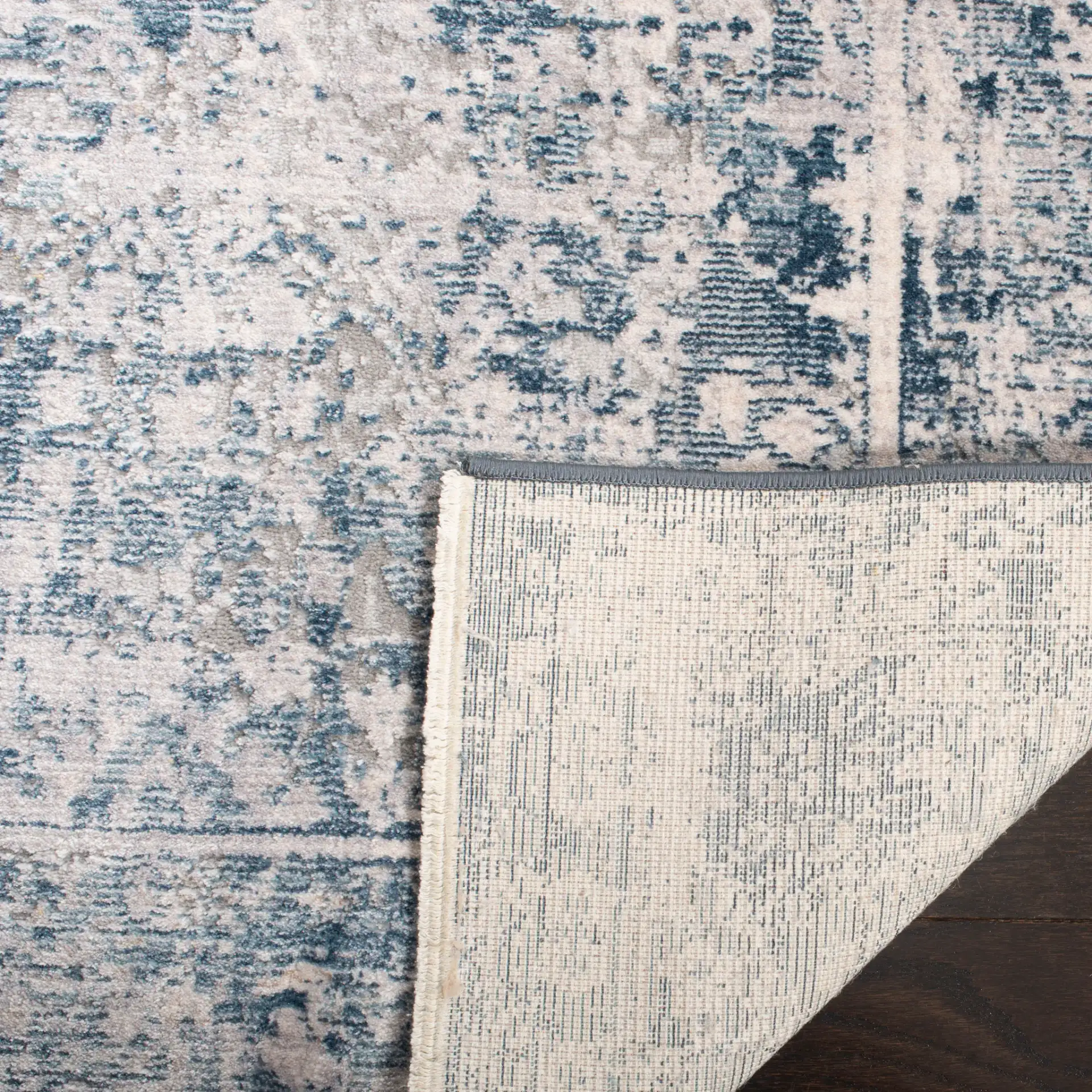 Winston Distressed Bordered Rug in Winston Distressed Bordered Rug in a styled room
