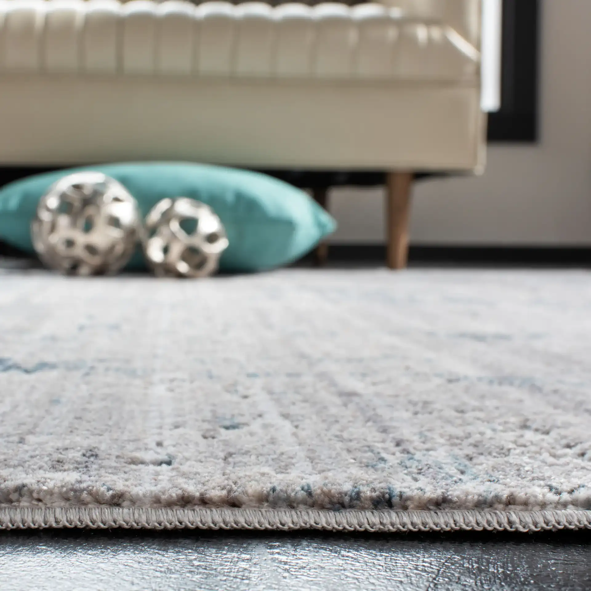 Winston Abstract Rug in Gray / Blue in a styled room