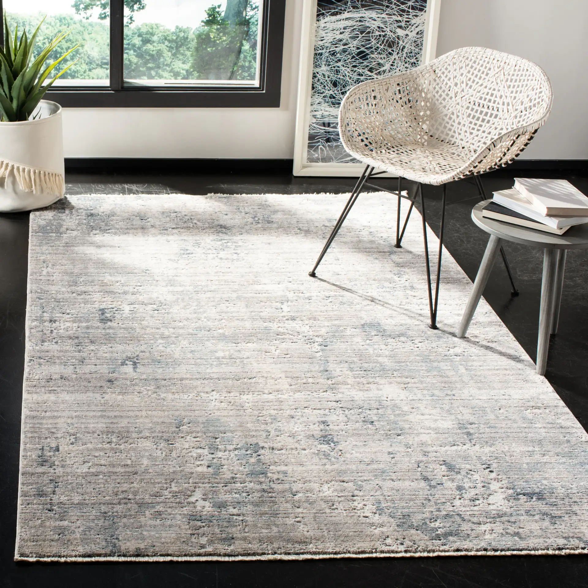 Winston Abstract Rug in Gray / Blue in a styled room