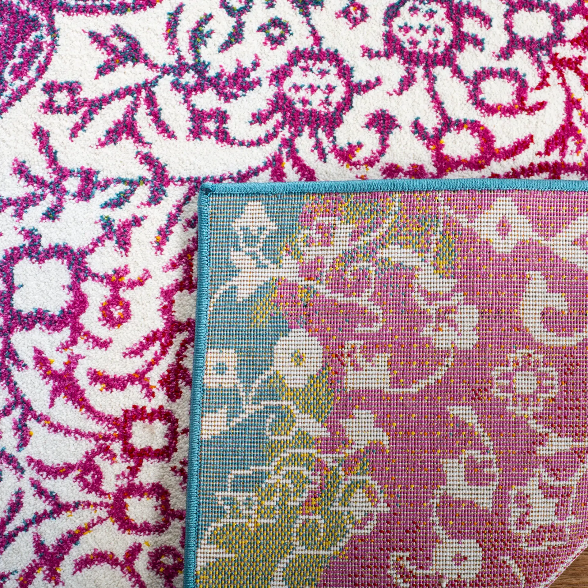 Watercolor Floral Medallion Rug in Ivory / Fuchsia in a styled room