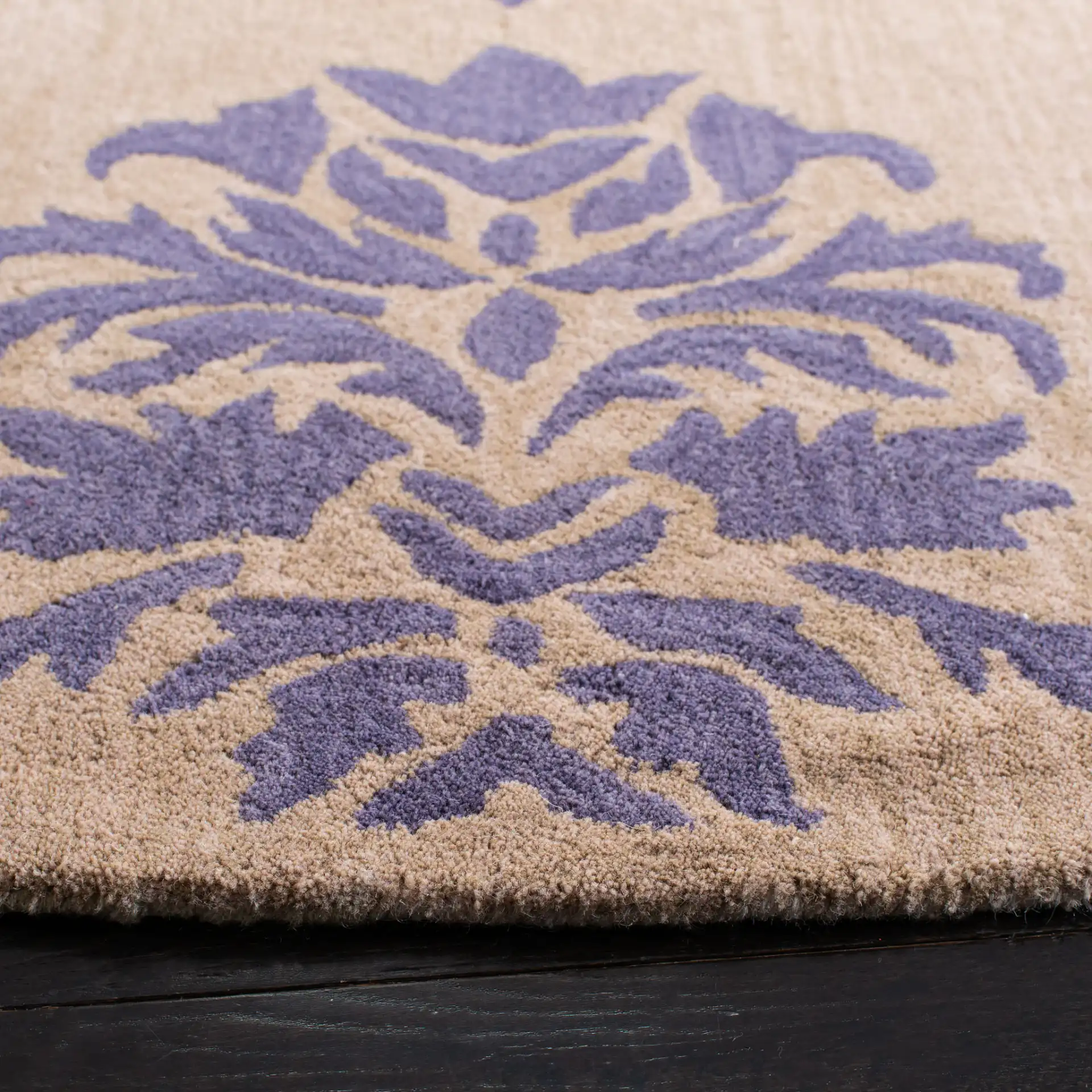 Wyndham Damask Block Hand-Tufted Wool Rug in Beige / Lavender in a styled room