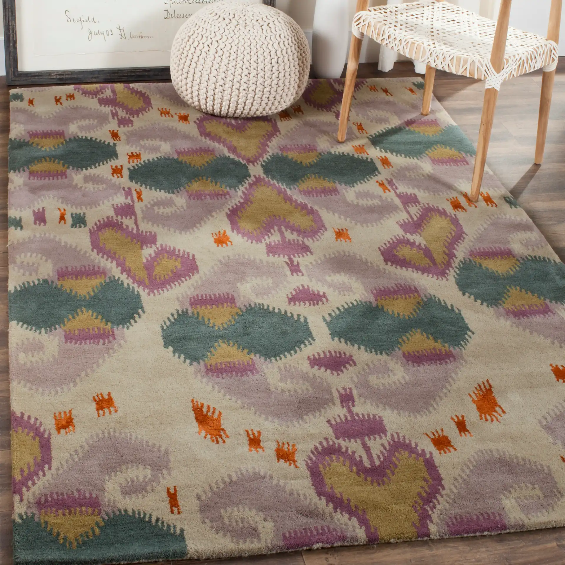Wyndham Ikat Medallion Wool Rug in Ivory / Multicolor in a styled room
