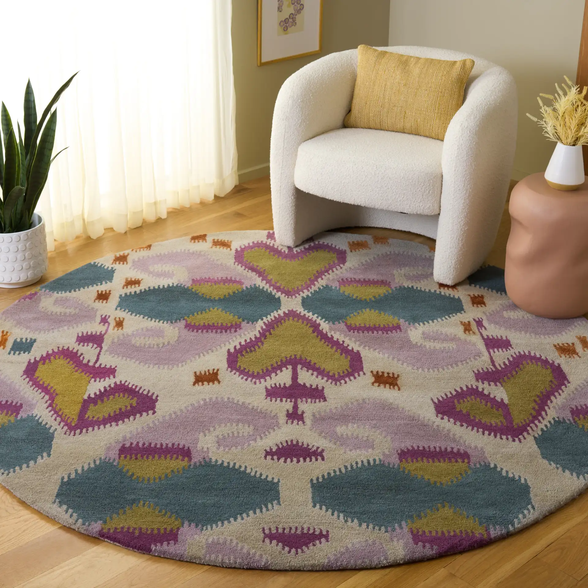 Wyndham Ikat Medallion Wool Rug in Ivory / Multicolor in a styled room