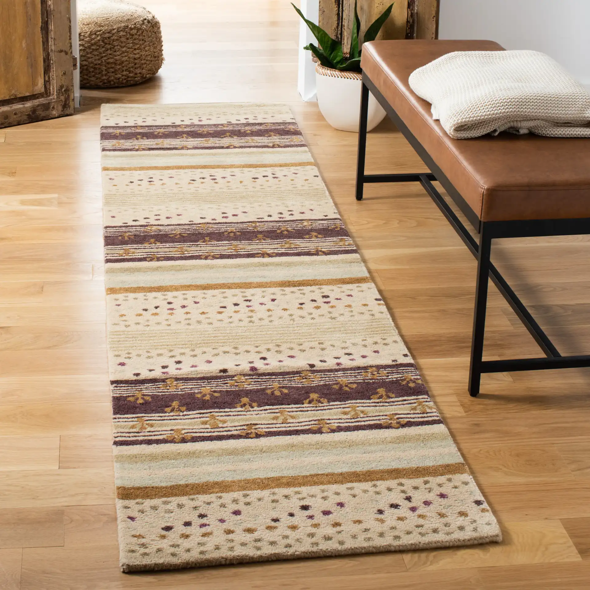 Wyndham Patterned Stripe Hand-Tufted Wool Rug in Ivory / Multicolor in a styled room