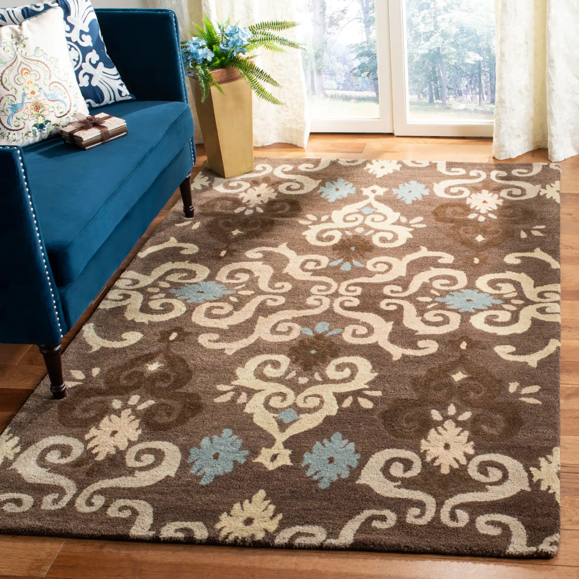 Wyndham Scrolling Damask Hand-Tufted Wool Rug in Brown / Multicolor in a styled room