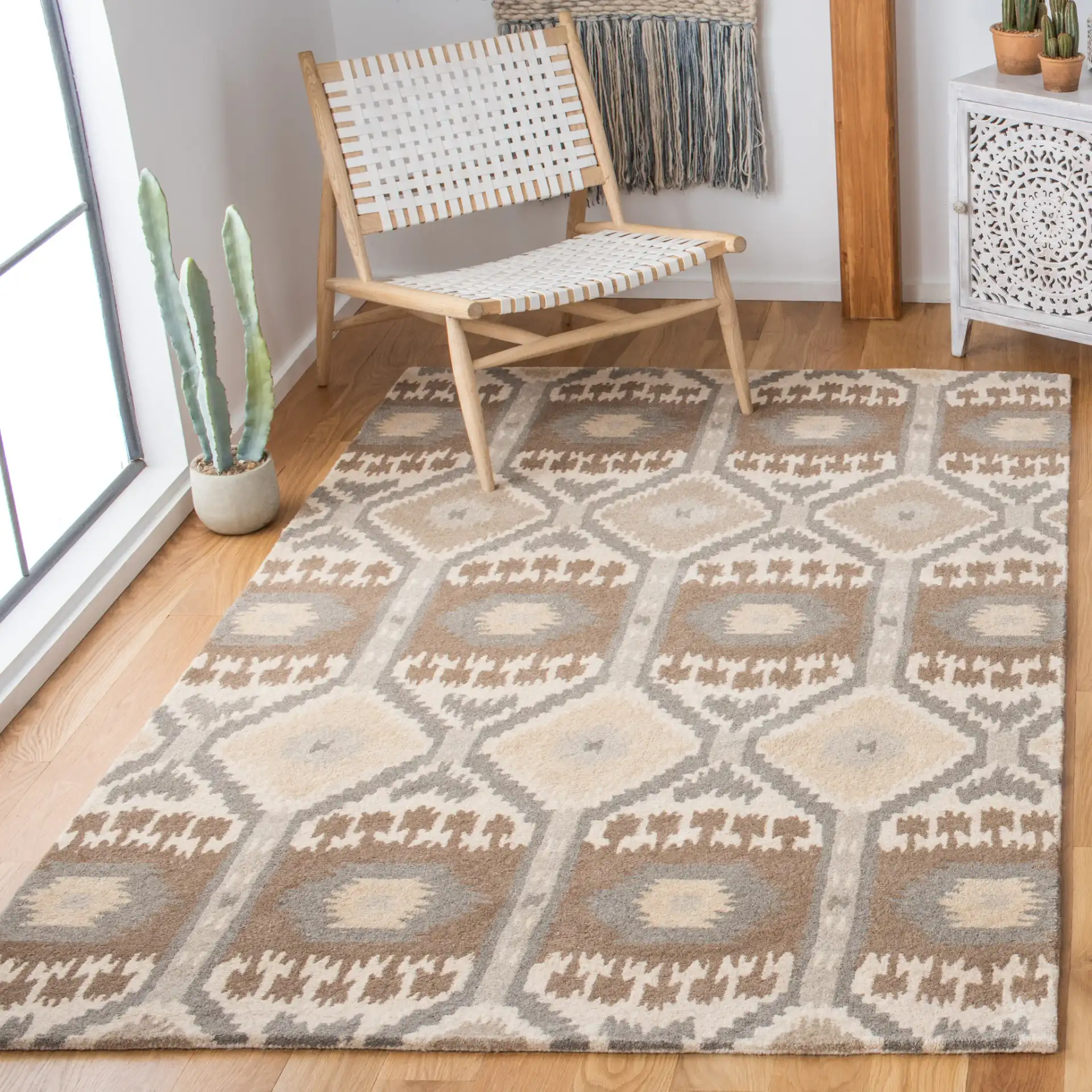 Wyndham Ikat Diamond Hand-Tufted Wool Rug in Natural / Multicolor in a styled room