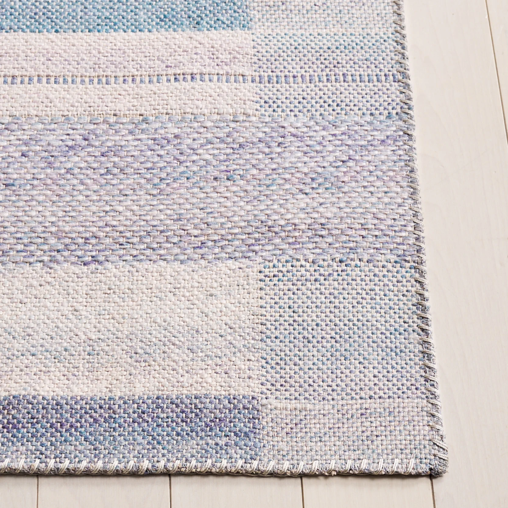 Cabo Striped Border Rug in Blue / Purple