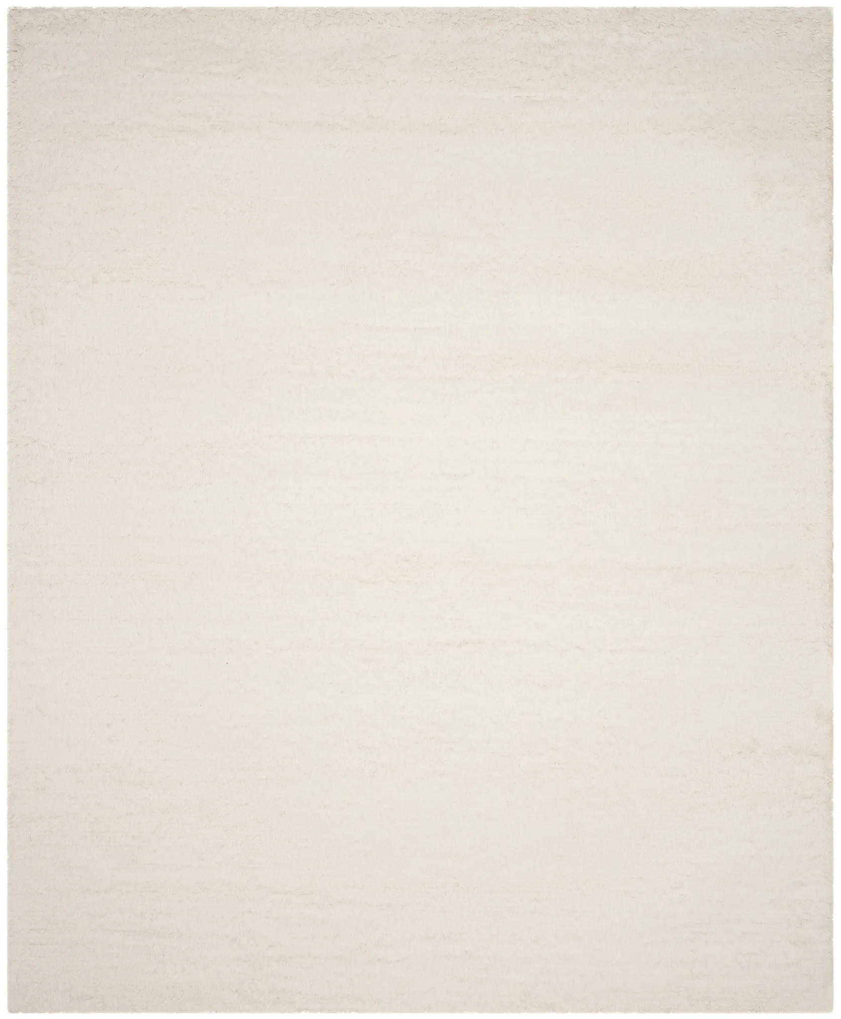 Flokati Solid Hand-Tufted Wool Shag Rug in Ivory