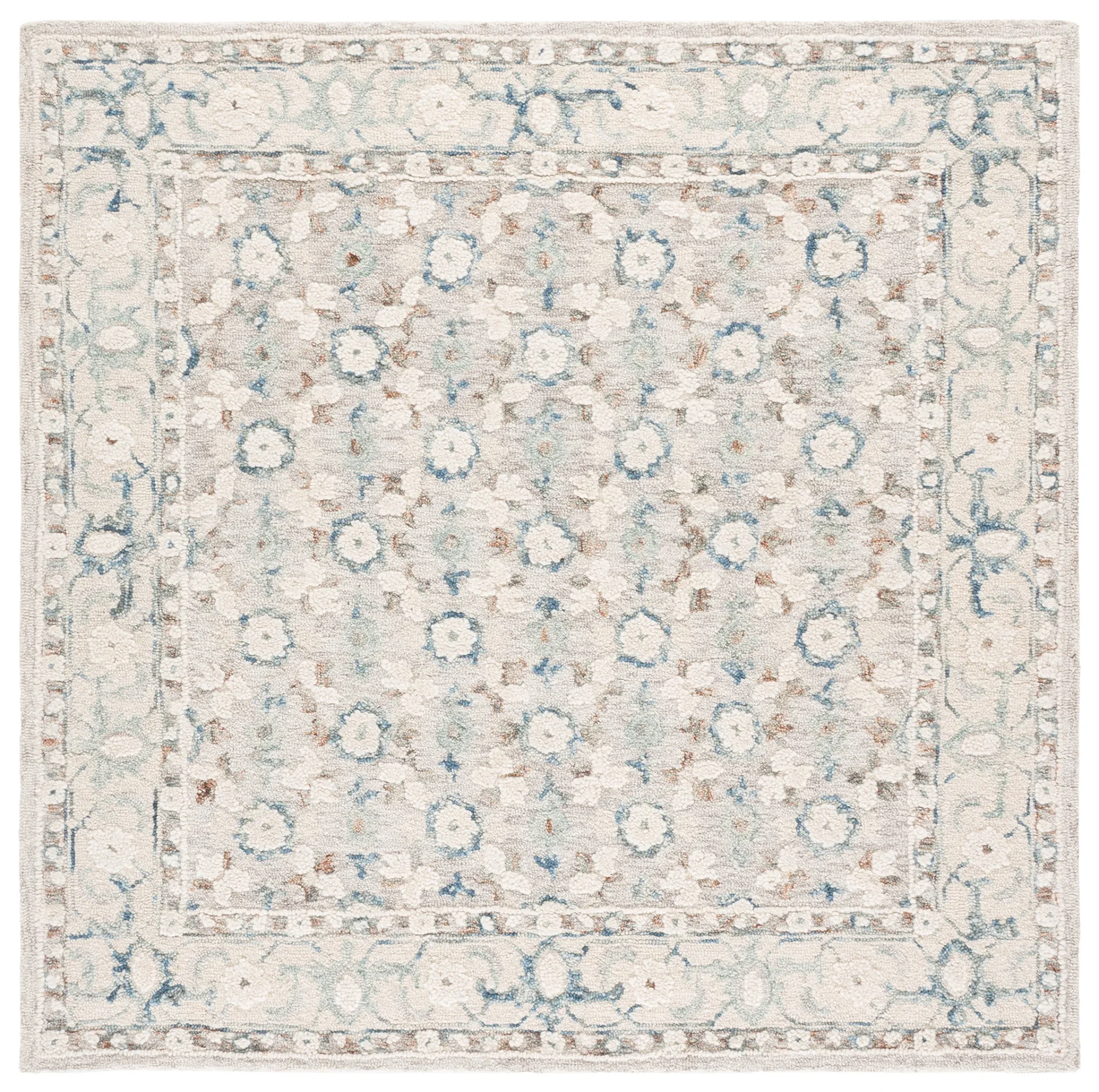 Metro Rosette Bordered Hand-Tufted Wool Rug in Ivory / Blue