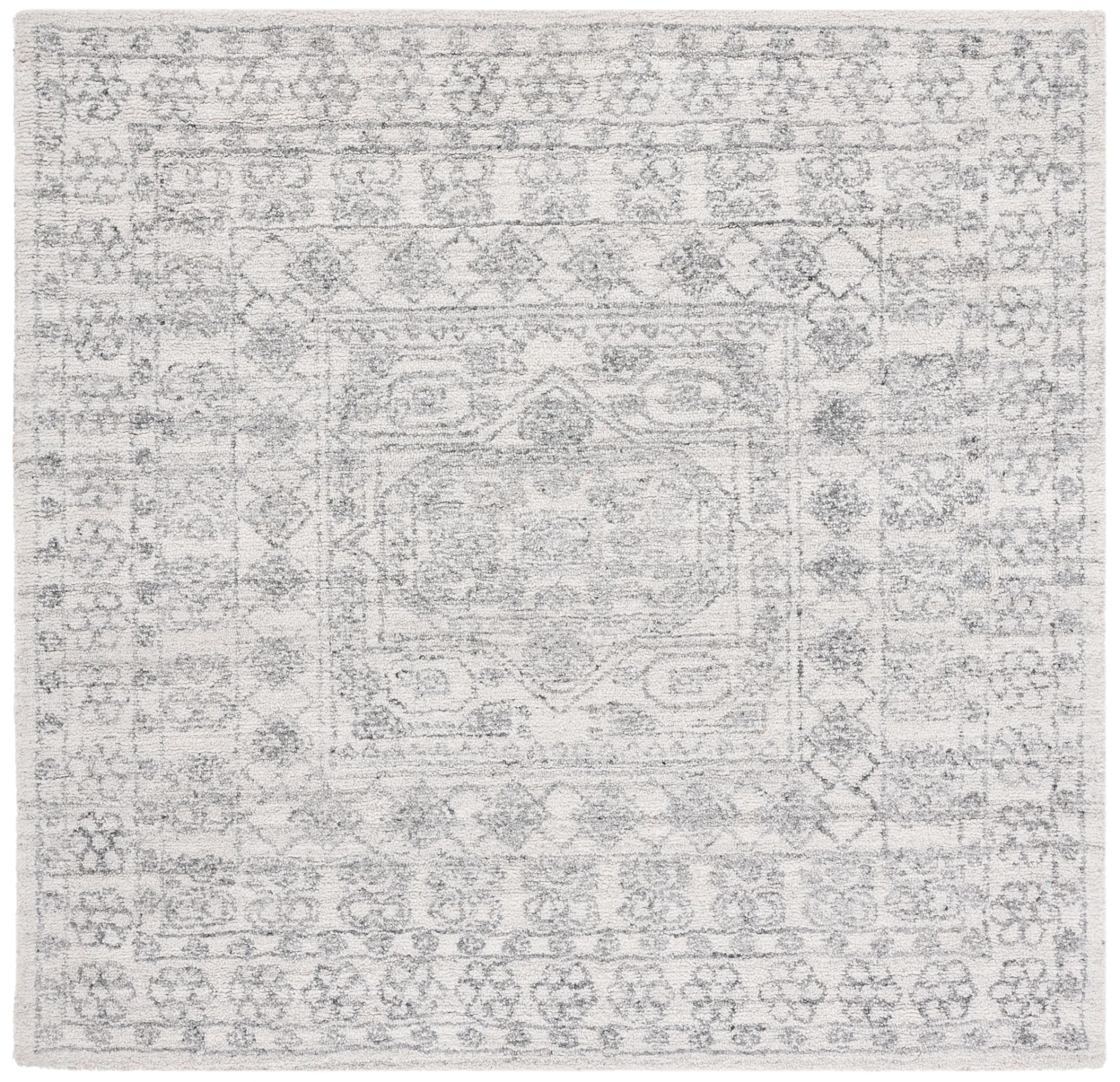 Marquee Faded Medallion Hand-Tufted Rug in Ivory / Gray
