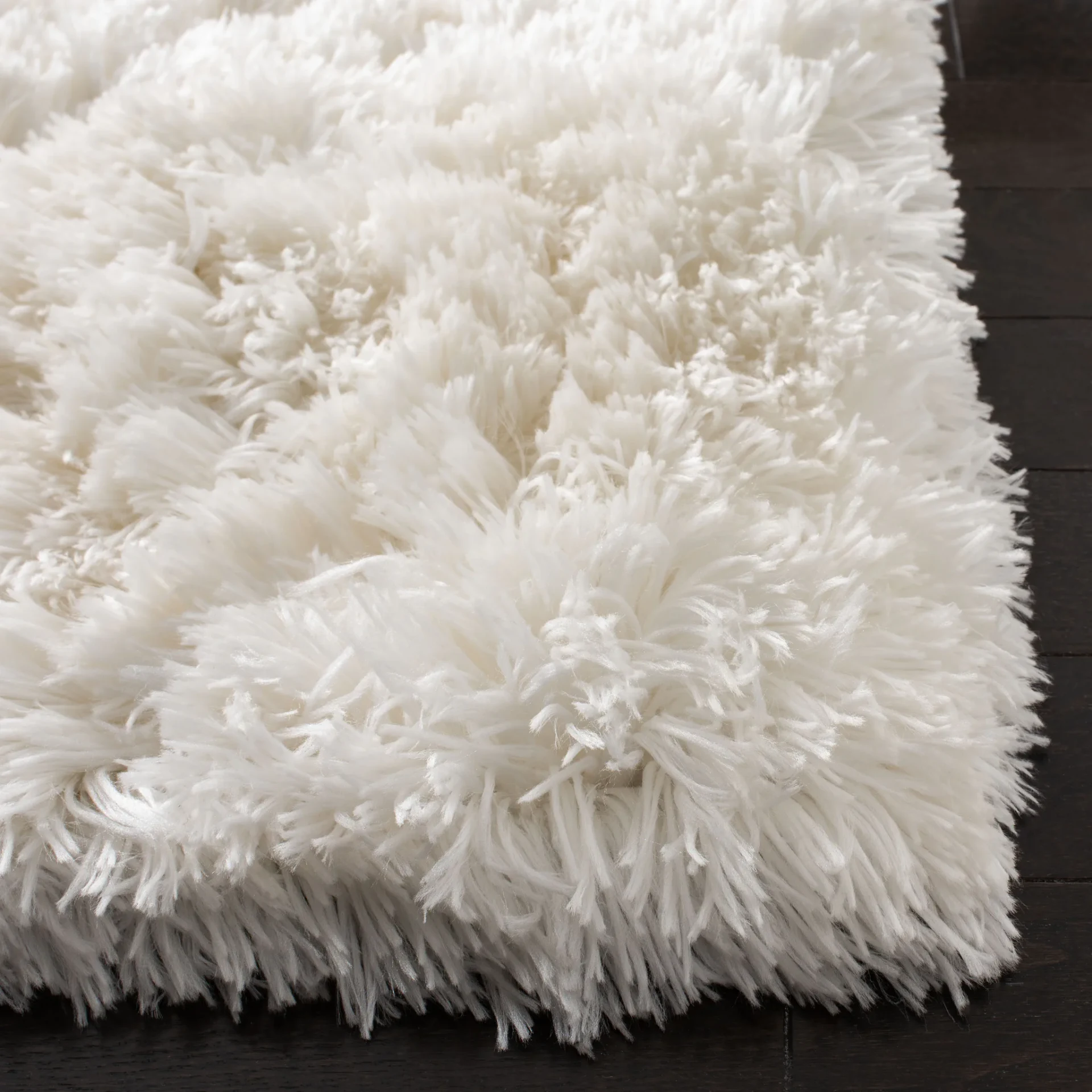 Arctic Solid Hand-Tufted Shag Rug in Ivory