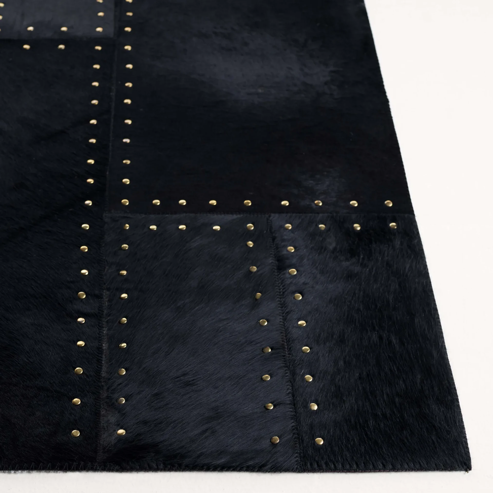 Studio Leather Stitched Patchwork Hand-Woven Rug in Black